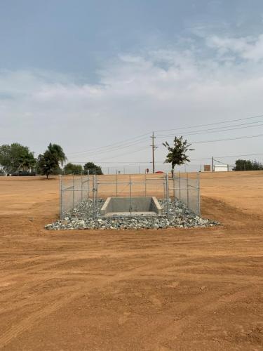 Completed Outfall Structure in Fancher Creek Detention Basin at the southwest corner of McKinley and McCall Avenues. Sanger, CA.